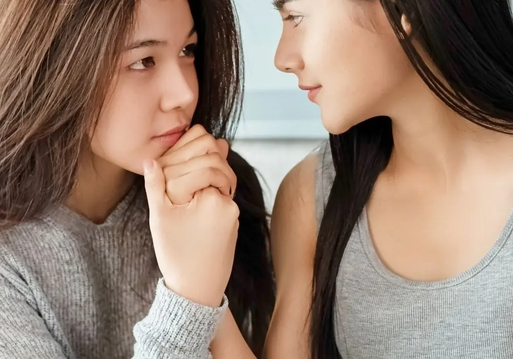 Partners looking at each other with care, representing relationship and marriage counselling in Vancouver